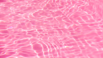 de-focused. Closeup of pink transparent clear calm water surface texture with splashes and bubbles. Trendy abstract summer nature background. for a product, advertising,text space.