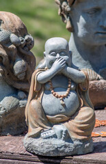 Fototapeta na wymiar Laughing Buddha statue represents happiness, abundance and well being
