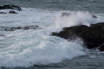 Waves crashing on rock in Ocean