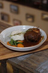 ossobuco in wine sauce, food, restaurant, meat