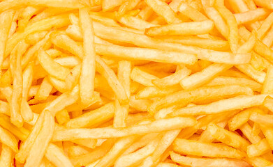 French fries background, potato chips close-up shot, top view, street food