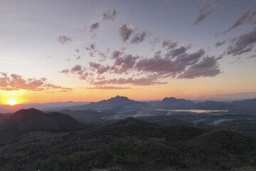 Forests and mountains at evening and smoke from forest fires. Pang Pui. Mae Moh, Lampang, Thailand.