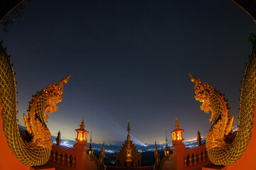 Beautiful landscape at night and viewpoint of Wat Phra That Doi Phra Chan Mae Tha Lampang,...