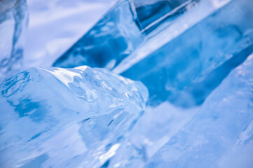 Obraz premium Blue transparent beautiful ice blocks, closeup view, abstract