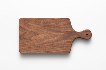 Handmade black walnut wood cutting board on white background. Handmade wooden chopping board. chopping board isolated on white