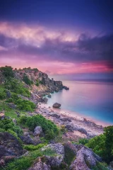 Foto op Plexiglas Lavendel zonsondergang over de zee