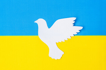 Support for Ukraine in the war with Russia, peace dove with flag of Ukraine. Pray, No war, stop war and stand with Ukraine concepts