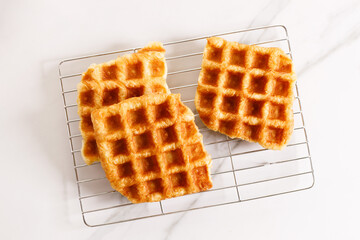 Croissant waffle or Croffle on  cooling rack.