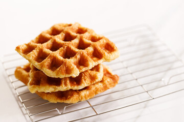 Croissant waffle or Croffle on  cooling rack.