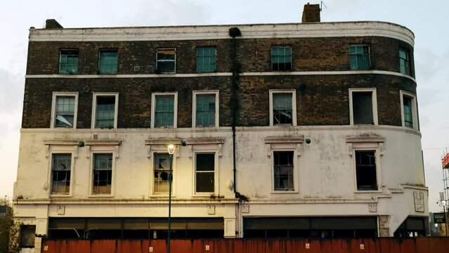 Establishing shot of a run down building in the city center