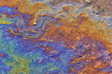 Fototapeta na wymiar multicolored spot gasoline abstract background, abstract oil spill on water