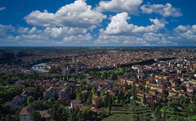 Obraz premium Aerial panorama of Verona, Italy. Historic Italian town panorama top view. Panoramic top view of Verona city center. Italian medieval city drone view. Italian churches in the old city aerial view.