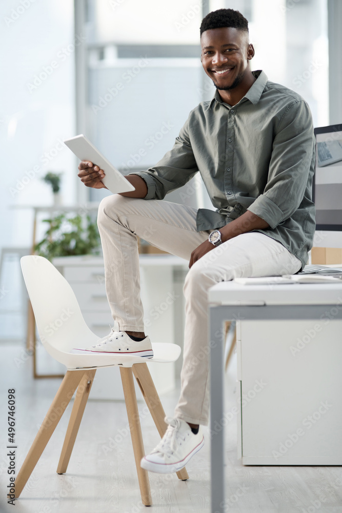 Aufkleber ready to present. shot of a young businessman working on a computer in an office.