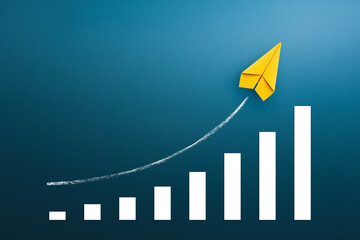 Yellow paper plane with growing graph, Growth and successful concept