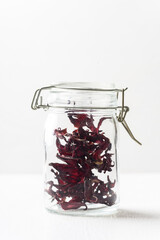 Dry roselle tea in glass jar