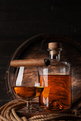 Glass and bottle with cognac