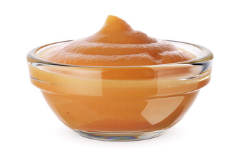 Glass bowl with apple puree isolated on white.