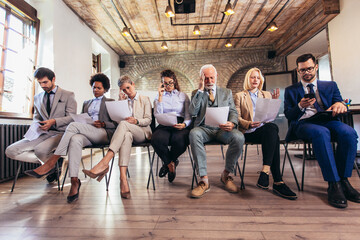 Business people waiting for job interview in modern office