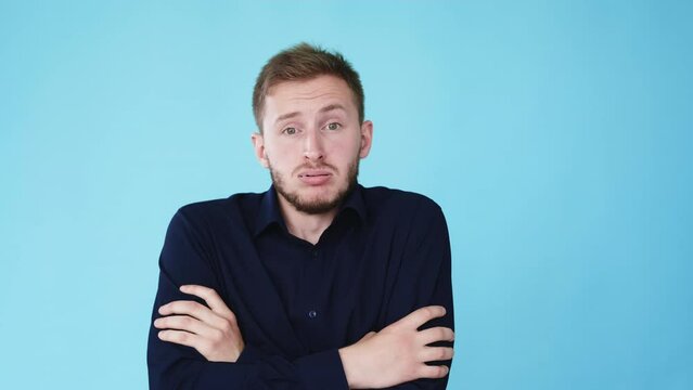 Cold man. Freezing expression. Fever symptom. Boomerang motion. Shaking trembling guy suffering from low temperature isolated on blue background GIF loop animation.