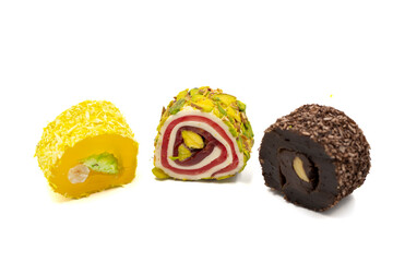 Assortment of Turkish delight with pistachio isolated on a white background. close up