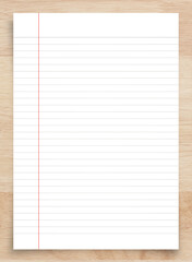 Naklejka premium White paper sheet on wood with clipping path. White notebook paper for background.