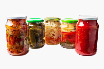 Fototapeta na wymiar Homemade canned various vegetables and spices in glass jars