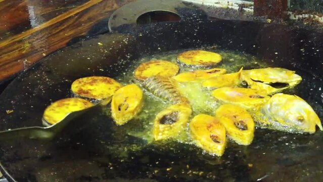 Frying Padma Ilish Fish at Mawa Ghat Bangladesh