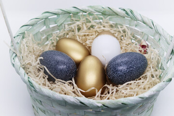 Painted Easter eggs in a basket