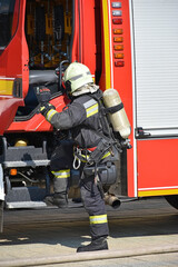 Firefighter at work in the city street