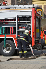 Firefighter at work in the city street