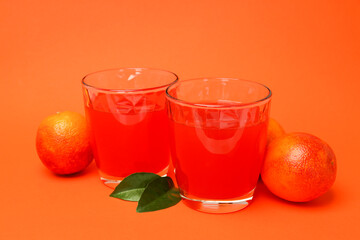 Concept of fresh drink with red orange juice