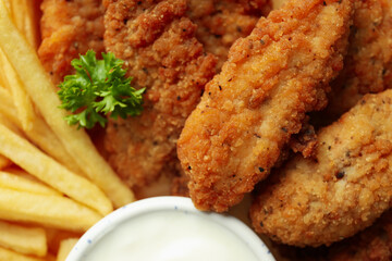 Concept of tasty food with Chicken strips, close up