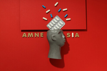 Concept of problems with memory, amnesia disease on red background