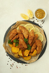 Concept of tasty food with Chicken strips, top view
