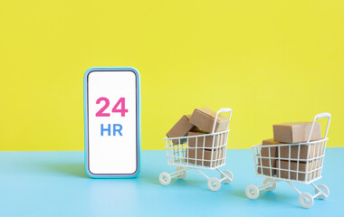 Business ecommerce or online shopping concepts with smartphone and product box order in trolley.