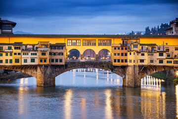 River Arno and famous bridge Ponte Vecchio at sunset from Ponte alle Grazie in Florence, Tuscany, Italy