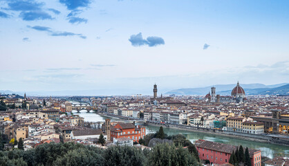 Obraz premium River Arno and famous bridge Ponte Vecchio at sunset from Ponte alle Grazie in Florence, Tuscany, Italy