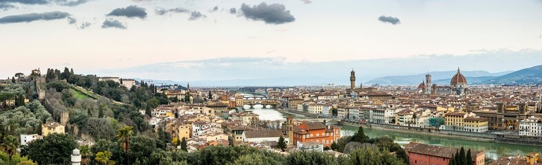 Naklejka premium River Arno and famous bridge Ponte Vecchio at sunset from Ponte alle Grazie in Florence, Tuscany, Italy