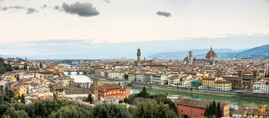 River Arno and famous bridge Ponte Vecchio at sunset from Ponte alle Grazie in Florence, Tuscany, Italy