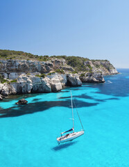 Beautiful bay with sailing boats, Menorca island, Spain.