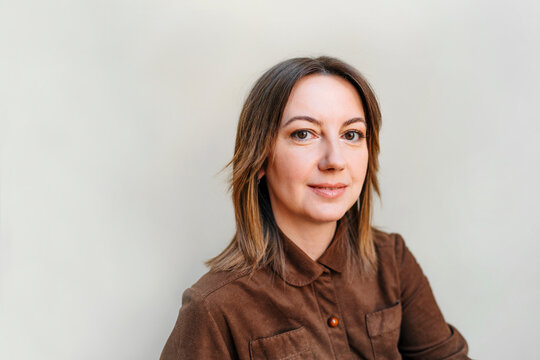 Smiling Woman Against White Background