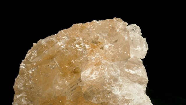 Pink Himalayan salt crystal. Macro. Dolly shot.