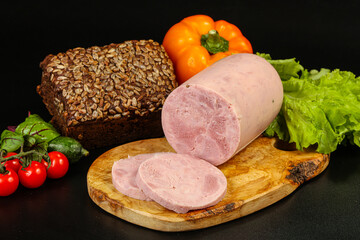 Pork ham sausage cut isolated