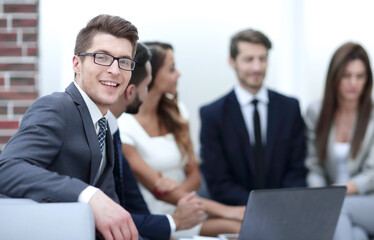 smiling businessman in the workplace
