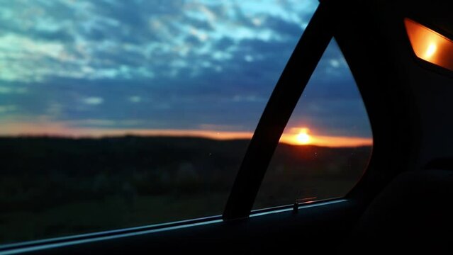 Beautiful sunset seen from inside a car