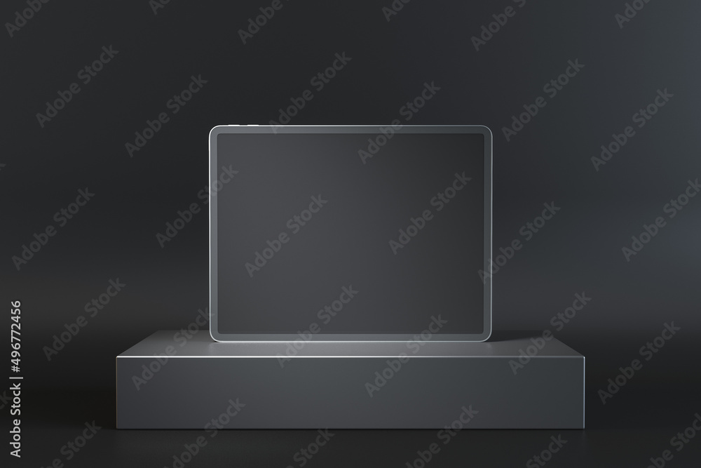Poster close up of empty tablet on round pedestal on black background with mock up place. presentation and 