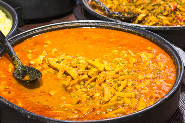 Chicken curry on display at Brick Lane Market in London