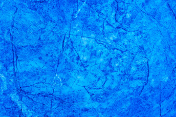 Abstract. Dark blue old concrete wall. The texture has an attractive unique pattern that is perfect for a Design background image.