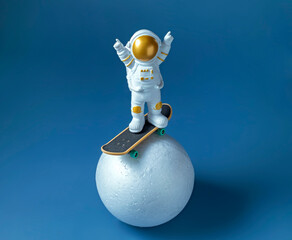 miniature astronaut figurine on a skateboard, International Day of Human Space Flight concept