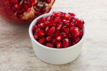 Ripe red Pomegranate seeds in the bowl